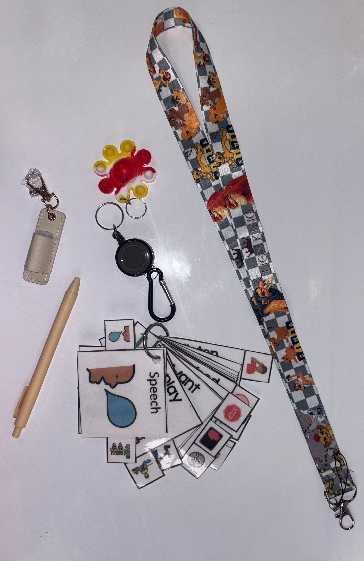 Lion King Multimodal Communication Lanyard with Fidget and Pen (Checker) – Sensory Support for Teachers, Therapists and Students with Autism